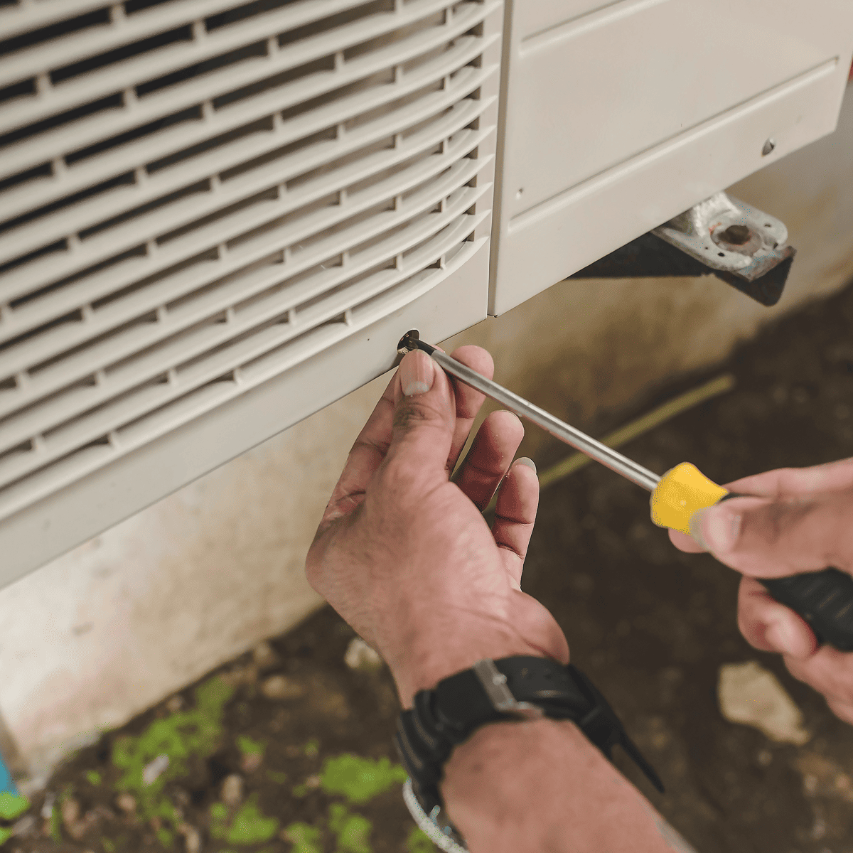 Winter Heating Checklist - A technician conducting Split System maintenance