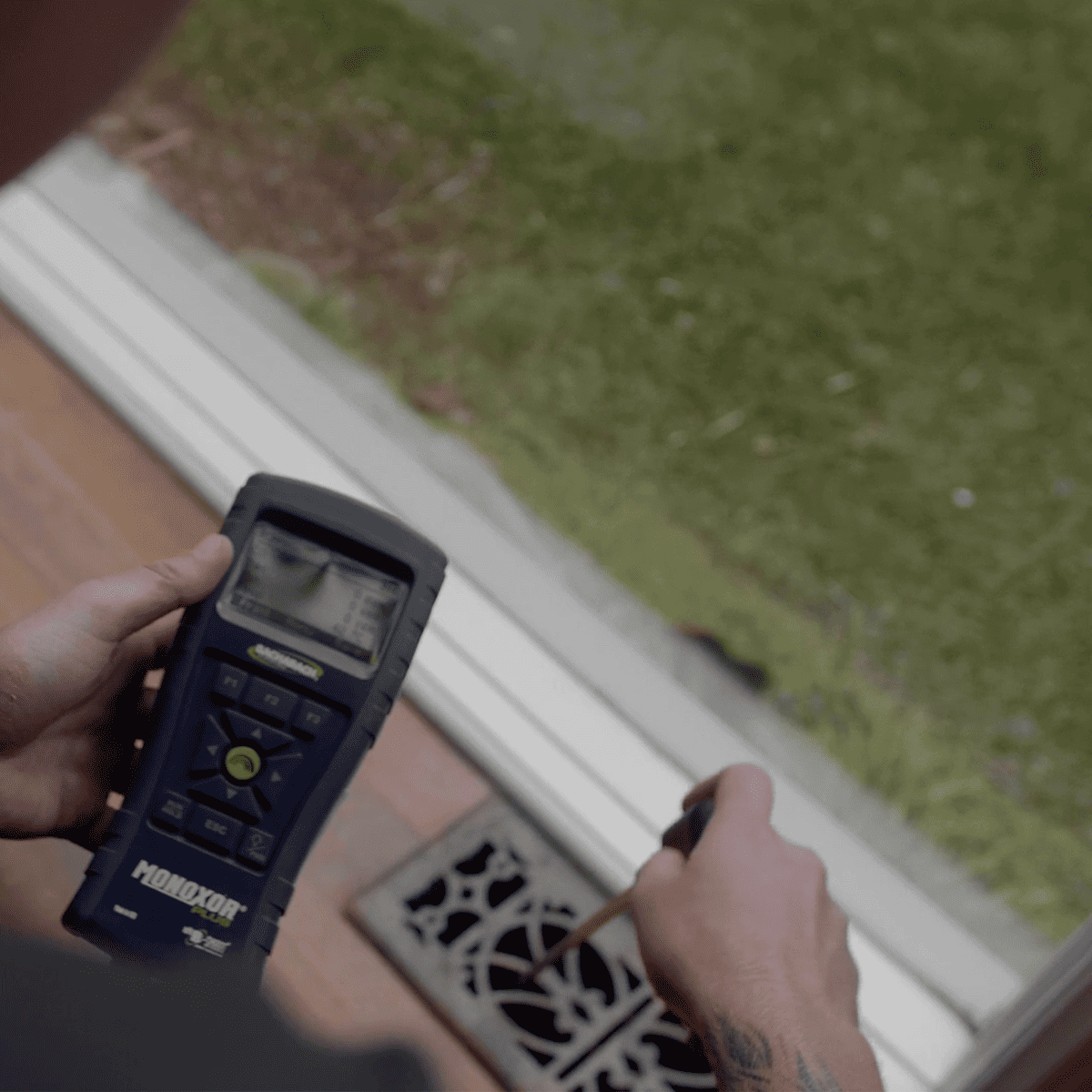 Winter Heating Checklist - Technician checking on ducted system