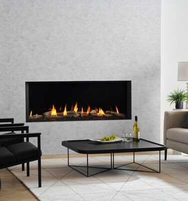 A cosy living room with a plush sofa and elegant Regency Aspire AS1440 fireplace, warmed by modern gas log fires for homes