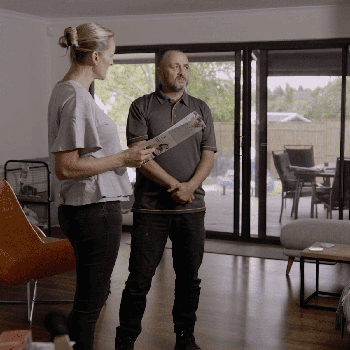 Fireplace Cleaning - Licensed technician discussing with client