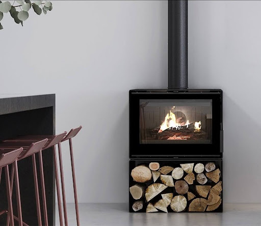 Modern black freestanding fireplace with visible flames, a stylish option for gas fireplace installation in Melbourne.