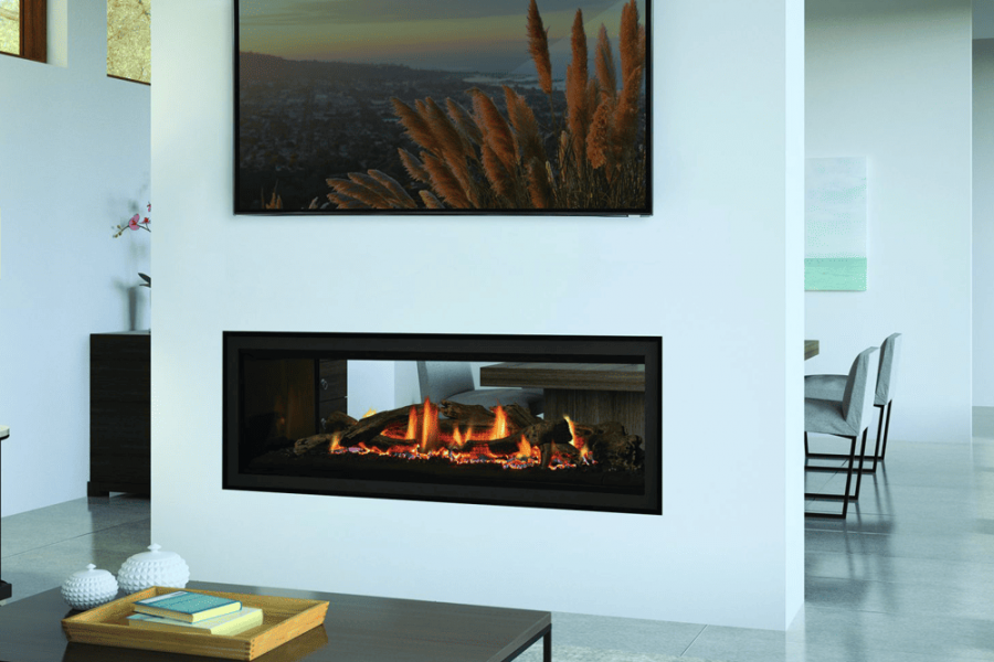 Modern living room with a Regency GF1500LST gas fireplace next to a TV, creating a cozy and contemporary home atmosphere