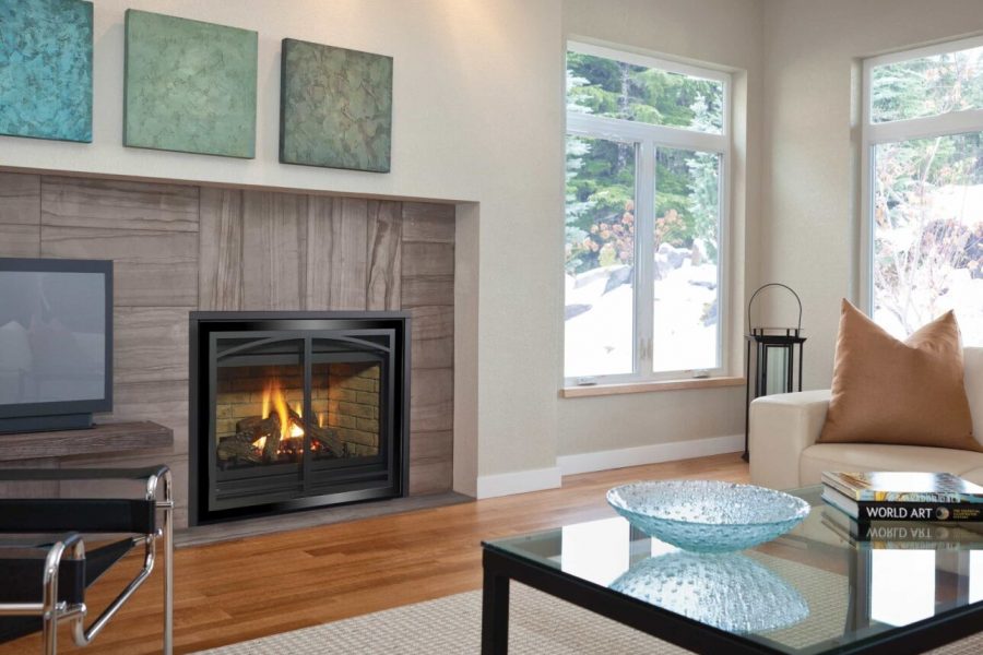 A stylish living room with a gas fireplace in Melbourne, designed for comfort with a mounted TV