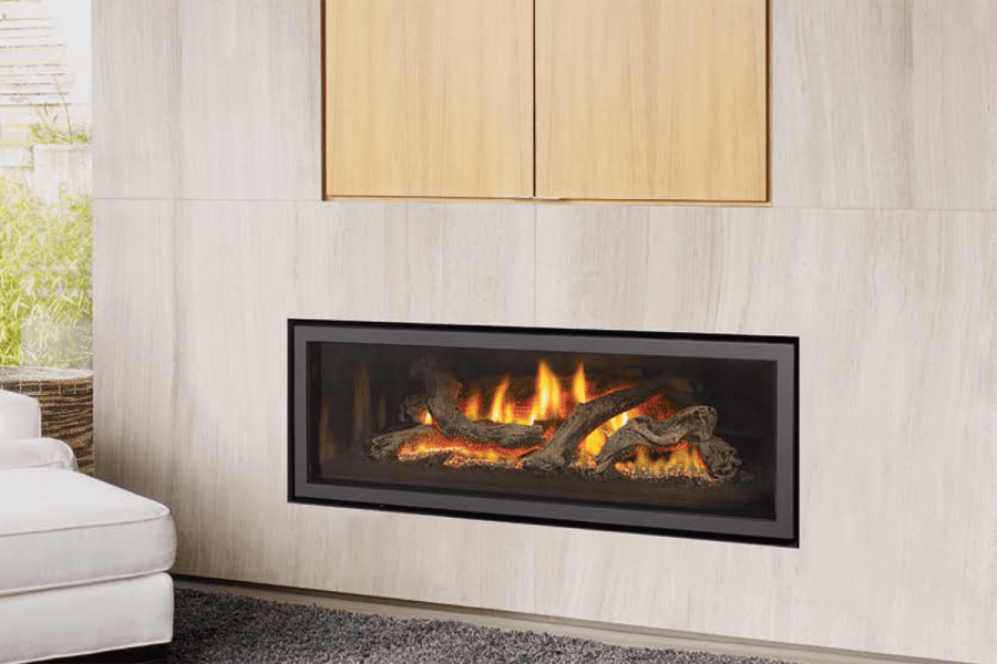A winter-ready living room with a Regency fireplace, complemented by a white chair and a white couch for comfort