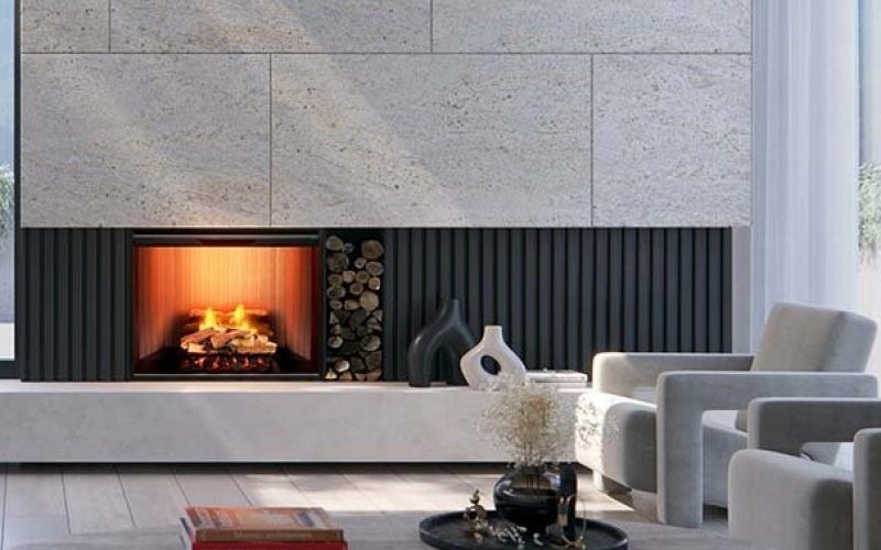A modern living room with a Real Flame Evo electric fireplace and a stylish couch, creating a cozy atmosphere