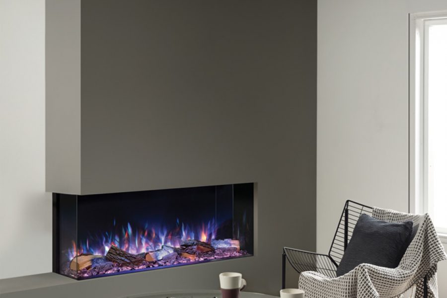 A minimalist living room with a Regency Gazco Onyx 110RW electric fireplace and a stylish table and chair